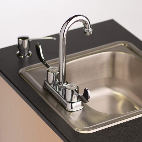 Laminate countertop and single stainless steel sink basin with built-in soap dispenser